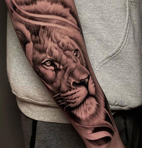 tatuajes de leones en el brazo|tattoo leones familia.